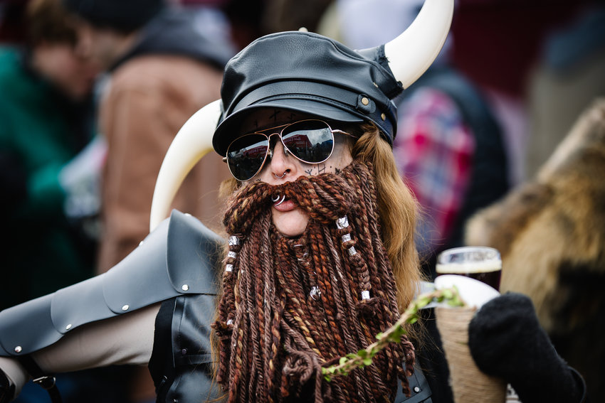 Bri Witherow with Barrels & Bottles Brewery poses for a photo in her Viking costume during UllrGrass. \